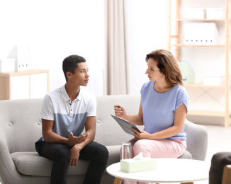 young man talking to woman