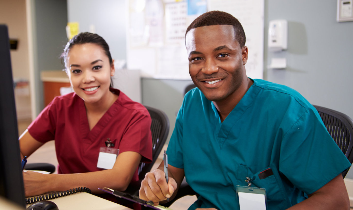 two nurses smiling