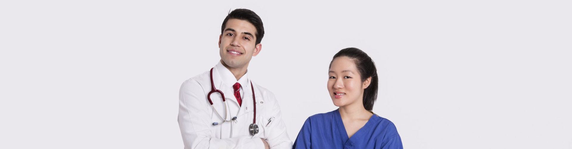 doctor and nurse smiling